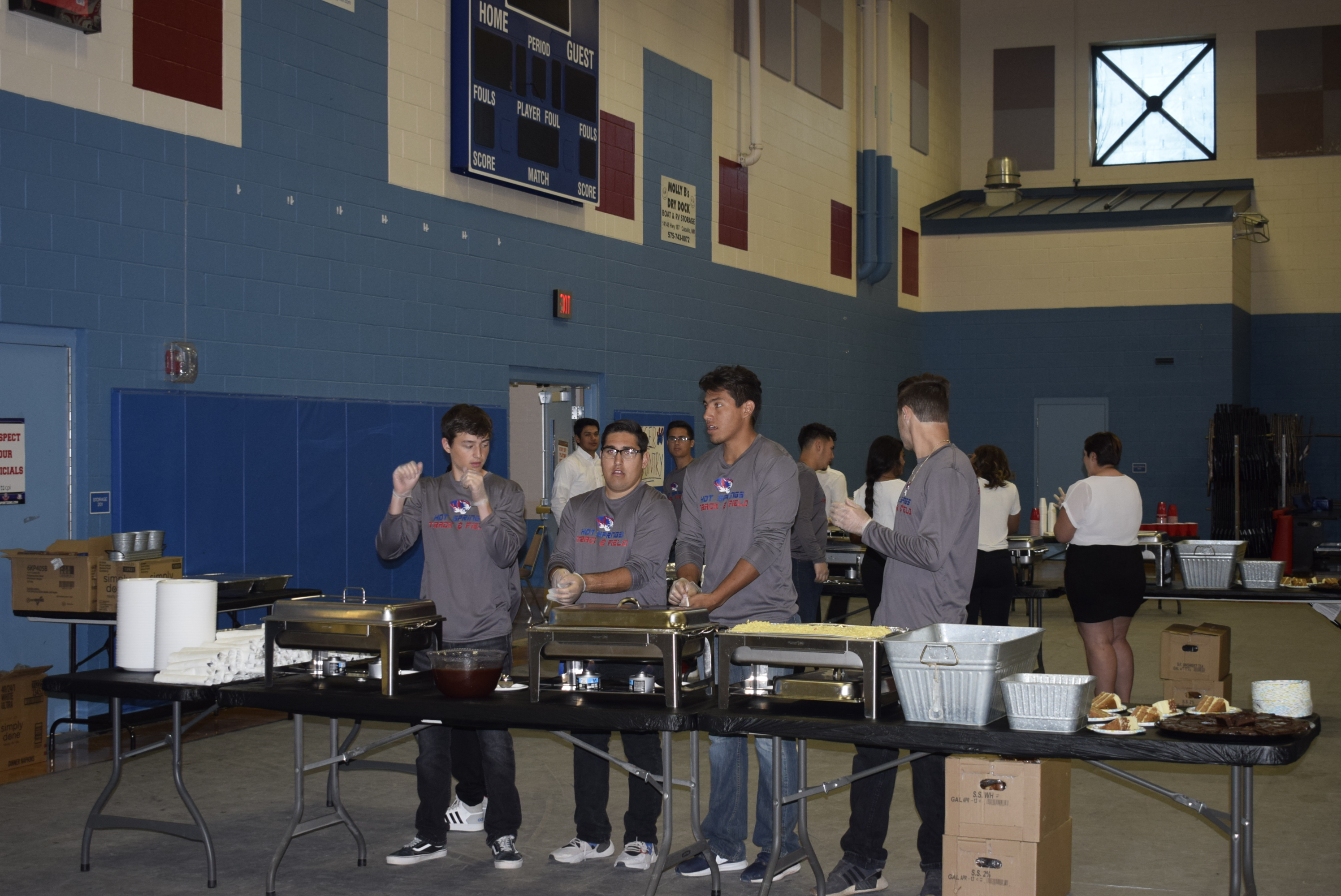 students serving meal